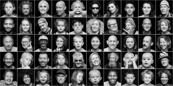 A grid of 42 black and white portraits featuring a diverse range of individuals of various ages, genders, and expressions. Some people are smiling, others are serious, and a few are making playful faces. The background is uniformly black in all portraits.